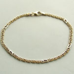 Gouden schakelarmband bicolor