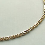 Gouden schakelarmband bicolor