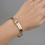 Christian wit en geel gouden slavenarmband