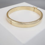 Christian slavenarmband 14 karaat goud