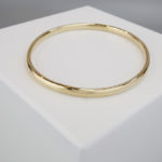 Christian slavenarmband geel goud