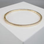 Goud Christian slavenarmband met diamanten