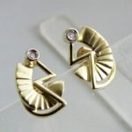 Gouden fantasie oorbellen met diamant
