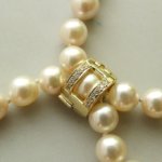 Parel collier met diamanten slot