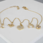 Goud enkelband met bedels