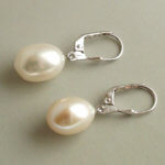 Wit gouden oorbellen met parel