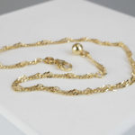 Gouden tors enkelarmband