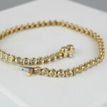 Christian gouden tennisarmband