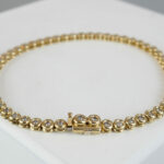 Christian gouden tennisarmband