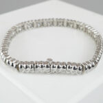 Christian wit gouden armband met diamanten
