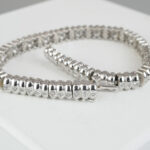 Christian wit gouden armband met diamanten