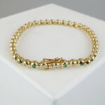Smaragd en diamant tennis armband