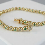 Smaragd en diamant tennis armband