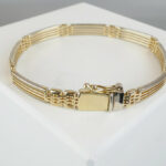 Bicolor goud Christian armband