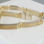 Bicolor goud Christian armband