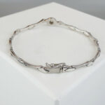 Christian wit goud armband met zirkonia