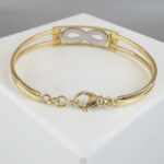 Christian 18 karaat bicolor gouden slavenarmband