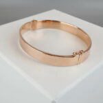 Christian rose gouden slavenarmband