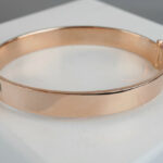 Christian rose gouden slavenarmband