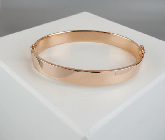 Christian rose gouden slavenarmband