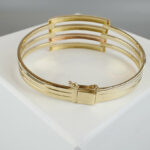 Gouden tricolor slavenarmband