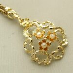 Geel gouden bloem parel collier