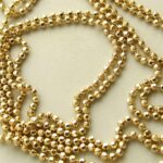 Geel gouden bolletjes collier