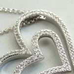 Wit gouden dubbele harten hanger