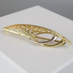 Bicolor gouden broche