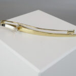 Bicolor gouden broche met diamanten