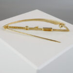 Bicolor gouden broche met zirkonia