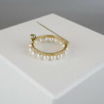 Broche met parels