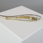 Gouden bicolor broche