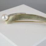Gouden broche met cultive parel