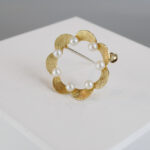 Gouden broche met parels