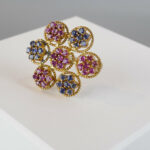Gouden broche met saffier en robijn