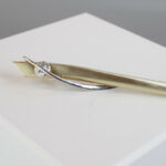 Gouden broche met zirkonia