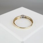 Bicolor gouden ring met 1 diamant