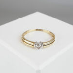 Bicolor gouden ring met 1 diamant