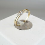 Bicolor gouden ring met 1 diamant