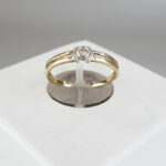 Bicolor gouden ring met 1 diamant