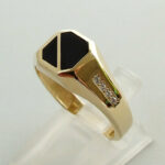 Gouden onyx en zirkonia ring