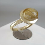 Christian gouden ring met rutielkwarts
