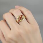Christian goud ring met 3 bloedkoralen