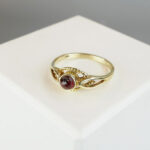 Gouden Christian ring met granaat