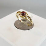 Gouden Christian ring met granaat