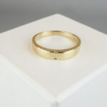 Gouden ring met klem zetting diamant