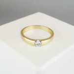 Gouden memoire ring met zirkonia
