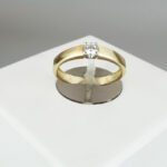 Gouden memoire ring met zirkonia