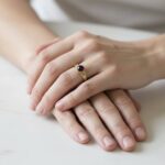 Christian goud ring met 1 granaat